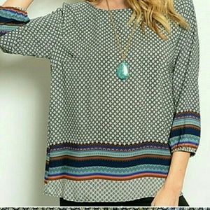 Large neck blouse 100% polyester. Satin lined